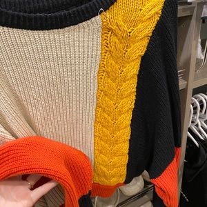 Black yellow and orange sweater